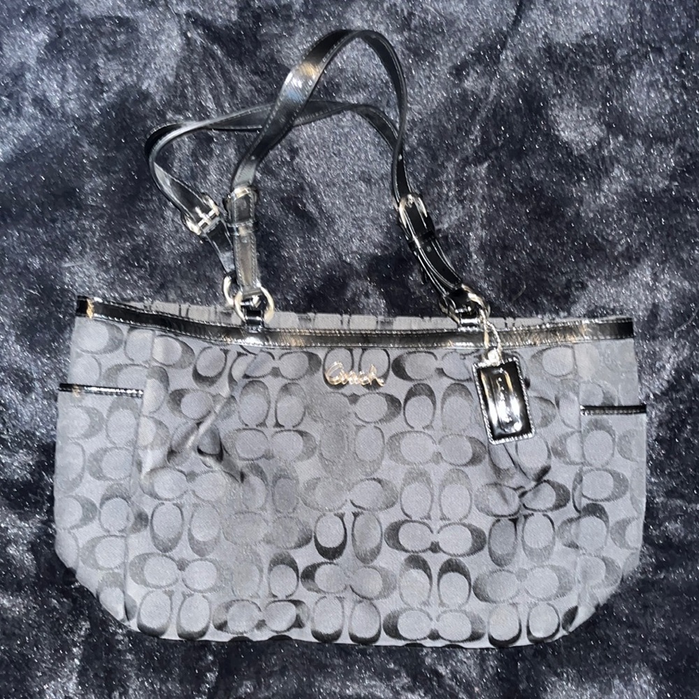 Black and grey Coach purse